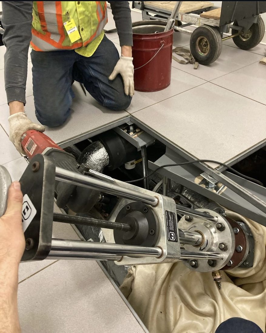 Hot tapping and line stopping machine being handled on site